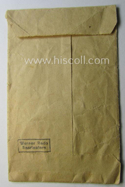 Empty 'variant'-pattern, 'Zellstoff'-based pouch as was intended for a medal: 'Winterschlacht im Osten 1941/42' as was produced by the company: 'Werner Redo' (ie. 'Hersteller 88')