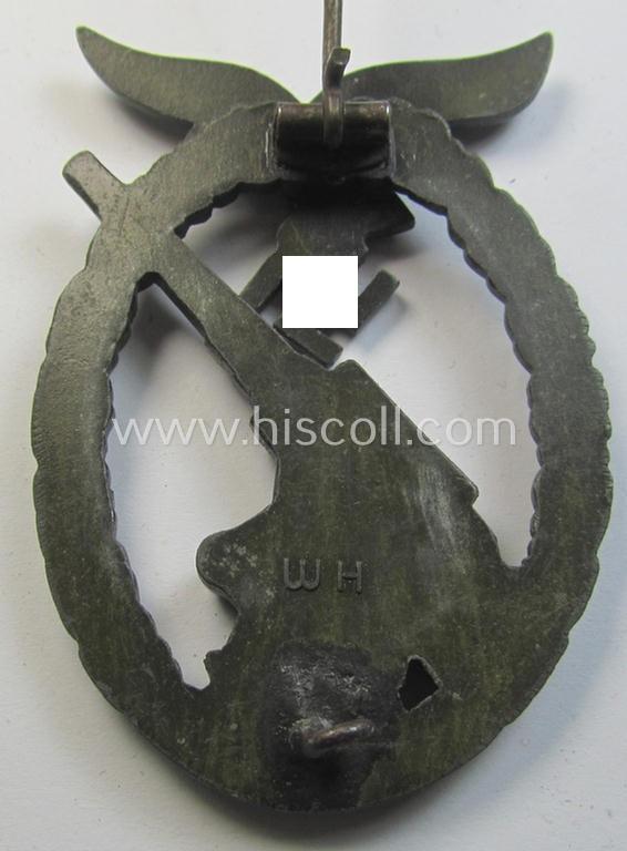 Later-war period- and/or: zinc- (ie. 'Feinzink'-) based- example of a maker- (ie. 'WH'-) marked, WH (Luftwaffe) 'Flakkampfabzeichen' (or: airforce anti-aircraft badge), as was produced by the desirable: 'Wilhelm Hobacher'-company