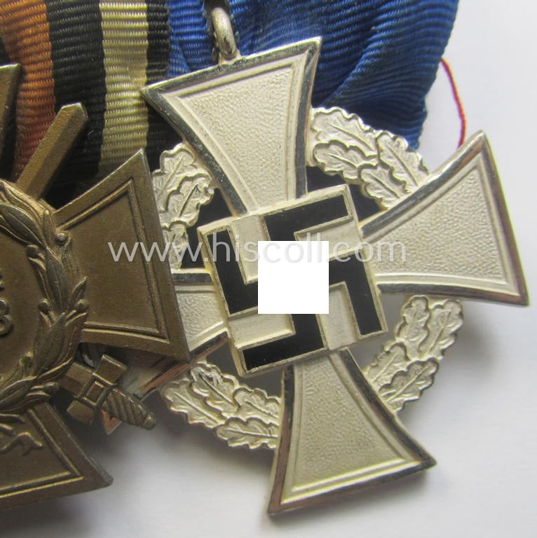 3-pieced, 'WWI'- (ie. TR-) related medal-bar (ie. 'Ordenspange') resp. depicting a WWI-period: 'EK II.Kl.', a: 'FKK 1914-18' and a: 'TD-Ez. der 2. Kl.'