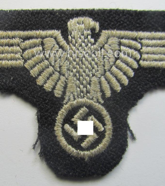 Mid- (ie. later-war-) pattern, 'SS' (ie. 'Waffen-SS') so-called: 'RzM-style' enlisted-mens'-/ie. NCO-pattern arm-eagle as was intended for usage by the various Waffen-SS troops throughout the war