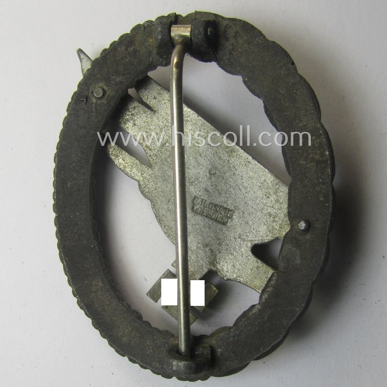Zinc- (ie. 'Feinzink'-) based version of a WH (Luftwaffe) 'Fallschirmschützen-Abzeichen' (being a maker-marked, 'Type D'-pattern example as was produced by the 'G.H. Osang'-company)