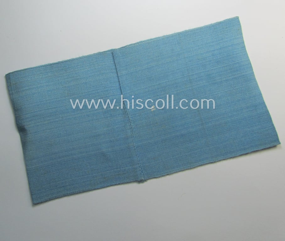 Linnen-based- and/or light-blue-coloured armband (ie. 'Armbinde') depicting an interwoven capital 'W'-character as was presumably intended for staff-members of the RLB (ie. 'Reichsluftschutz-Bund') serving as: 'RLB-Wache' (ie. air-raid-warden guard)