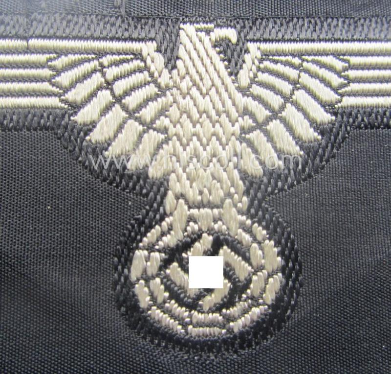 Mid- (ie. later-war-) pattern, 'SS' (ie. 'Waffen-SS') so-called: 'BeVo-weave-style', enlisted-mens'- ie. NCO-pattern arm-eagle (ie. 'Ärmeladler für Mannschaften u. Unterführer') as was intended for usage by the various Waffen-SS-troops