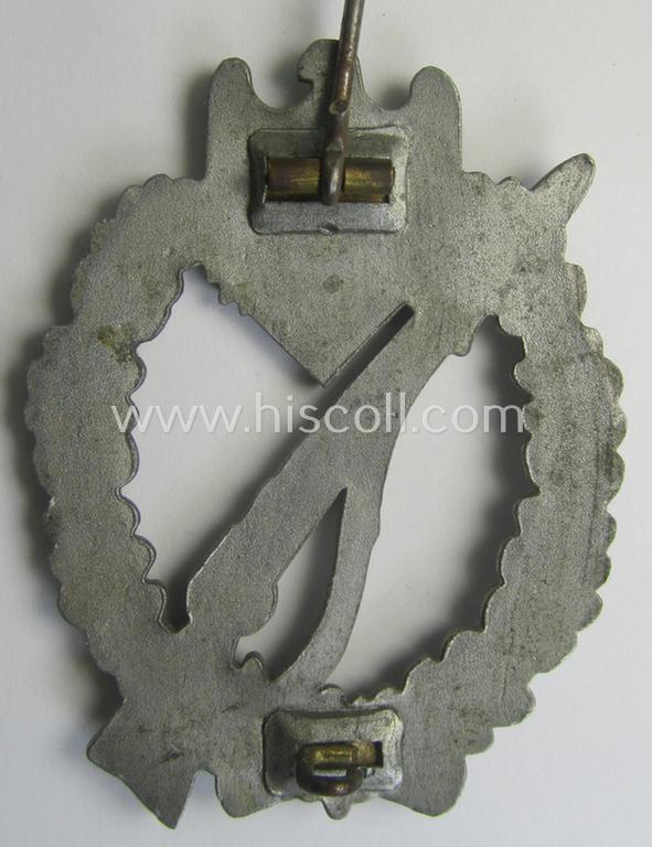 Silver-class 'Infanterie Sturmabzeichen in Silber' being a (typically) unmarked so-called: 'pillow-crimped'-pattern example as was executed in silverish-coloured, zinc-based metal (ie. 'Feinzink')