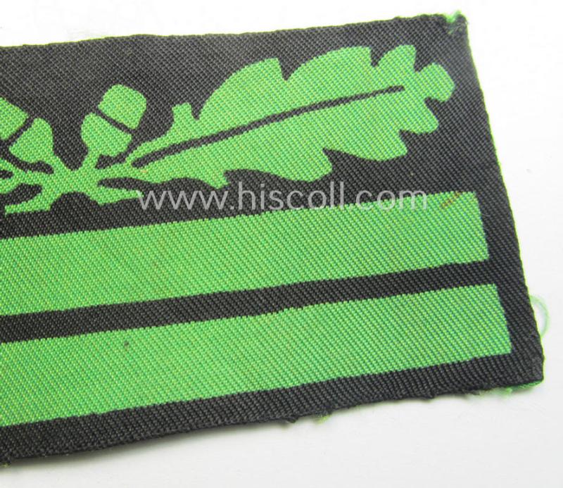 Attractive - clearly used albeit regrettably single! - officers'-pattern, WH (Heeres o. Waffen-SS) rank-insignia-bar (for usage on the camouflaged-uniforms) as used by an officer holding the rank of: 'Oberleutnant' (ie.: 'SS-Obersturmführer')