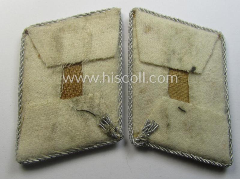 Rarely seen - and fully matching! - pair of hand-embroidered WH (Luftwaffe) officers'-type collar-patches as executed in white-coloured wool as intended for a: 'Hauptmann' serving within one of the units of the: 'Hermann Göring-Division'