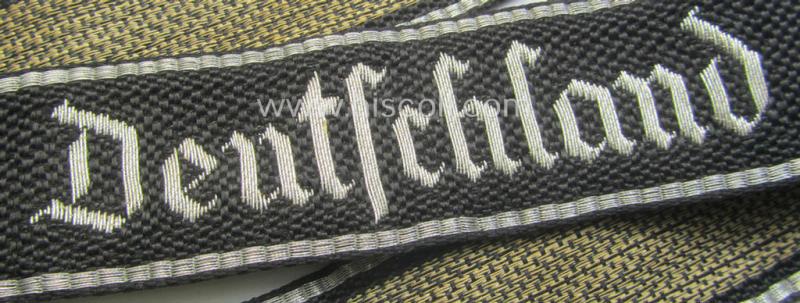 Waffen-SS officers-type, 1939/40-pattern cuff-title (ie. 'Ärmelstreifen') as executed in flat-wire 'BeVo'-weave-pattern (in Gothic-styled script!) for an officer who served within the: SS-Rgt. 'Deutschland' (2. SS-Pz-Div. "Das Reich")