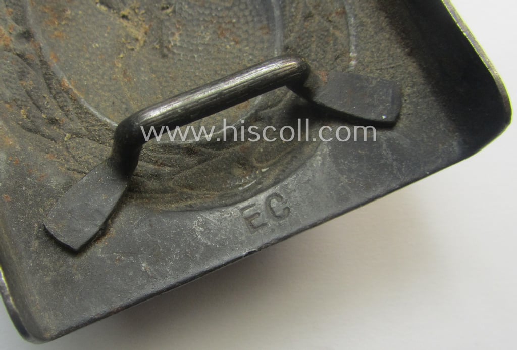 Moderately used example of a WH (Luftwaffe) blue-coloured- and/or typical steel-based belt-buckle, being a clearly maker- (ie. 'EC'-) marked example