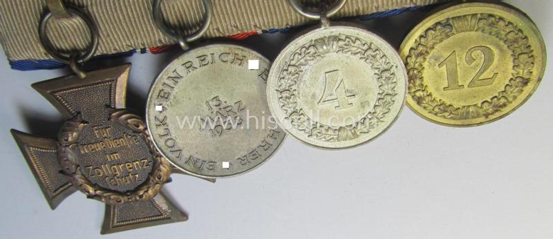 Attractive, 4-pieced medal-bar (ie. 'Ordenspange') showing two WH (Heeres or KM) so-called: 'DA für 4 u. 12 Jahre treue Dienste', an: Austrian 'Anschluss'-medal and a (scarce!): 'Zollgrenzschütz-Ehrenzeichen' (or: customs loyal-service medal)