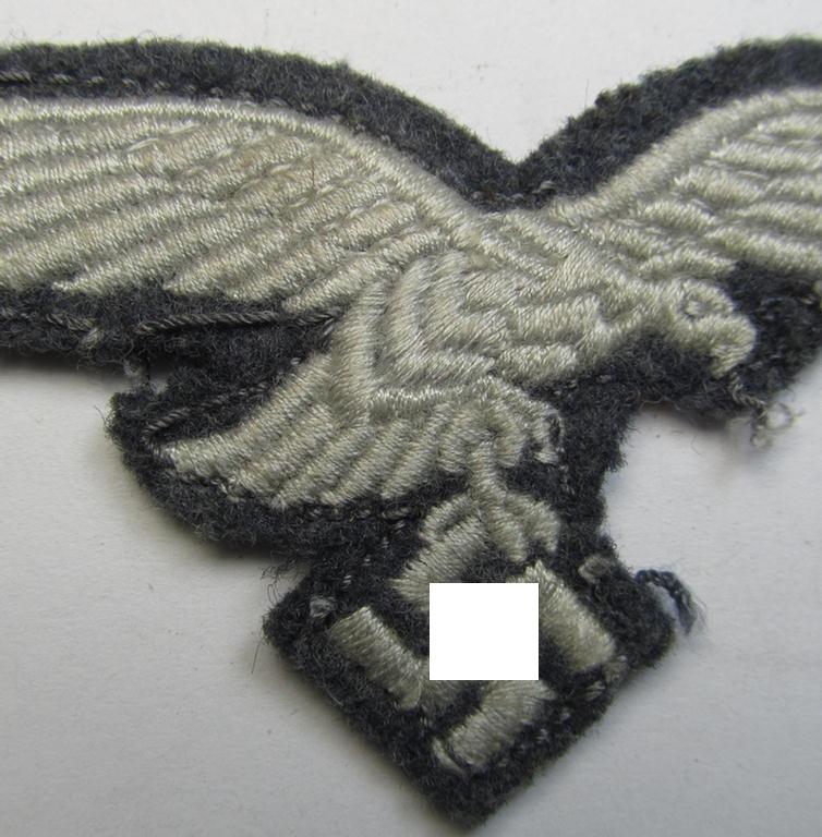 WH (Luftwaffe) 'standard-issue'-pattern breast-eagle (ie. 'Brustadler für Mannschaften u. Uffz. der Luftwaffe') being a machine-embroidered example and that comes in a neat and carefully tunic-removed condition