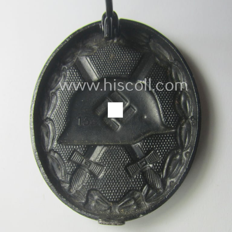 Superb, black-class wound-badge (or: 'Verwundeten-Abzeichen in Schwarz') being a neatly maker- (ie. '13'-) marked example that was produced by the maker (ie. 'Hersteller') named: 'Gustav Brehmer'