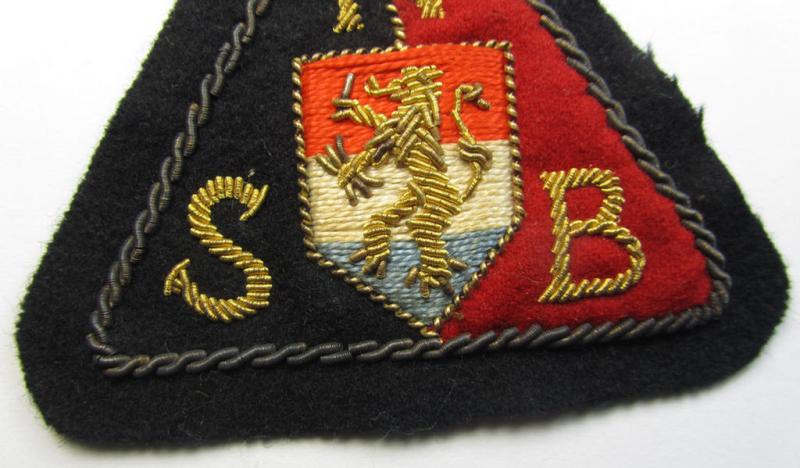 Superb - and presumably Dutch-produced - example of an (I deem) early-pattern and neatly machine-woven NSB- (or: 'Nationaal Socialistische Beweging'-) related- and hand-embroidered arm-patch as was intended for usage on the black-coloured attire