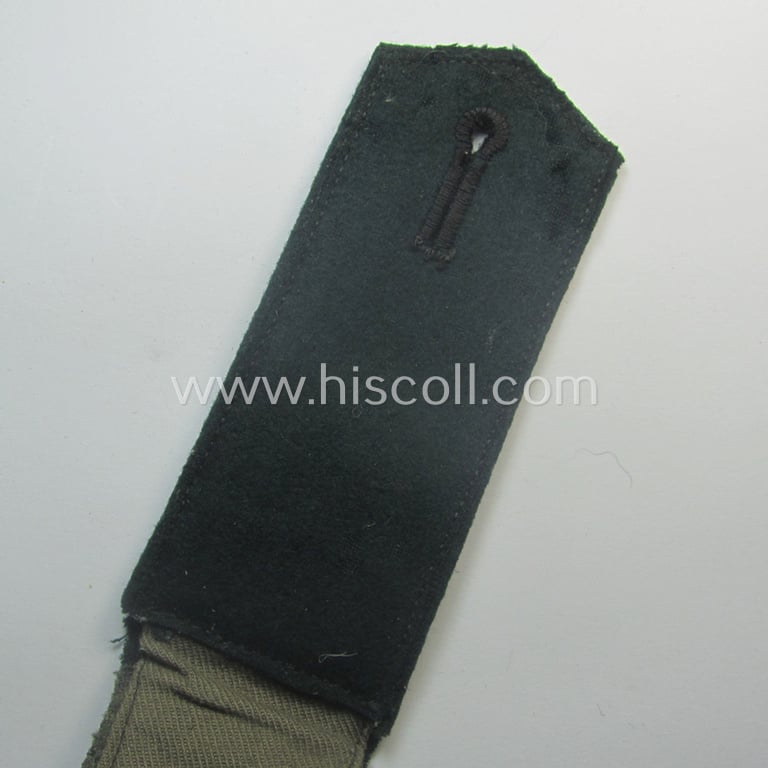 Single, WH (Heeres) EM-type 'cyphered' shoulderstrap: 'Soldat des Artillerie-Rgts. 99'