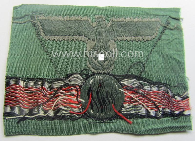 WH (Heeres) so-called: 'M43-pattern') cap-eagle/cocarde (ie. cap-trapezoid) as was specifically produced for usage on the so-called: 'M-43'-model field-caps (ie. 'Einheitsfeldmützen')