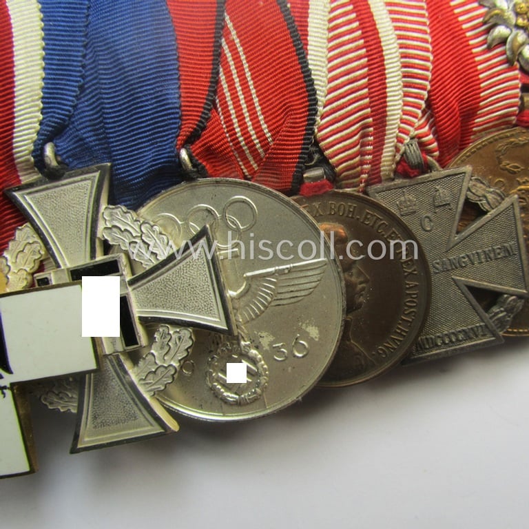 Superb, 8-pieced WWI- (ie. TR-) related medal-bar (ie. 'Ordenspange') depicting an: 'EKII.Kl., an: 'FKK 1914-18 mit S.', an: 'EZ für D. Vp 3. Stf.', a: 'TD-Ez. der 2. Kl.', a: 'Deu. Olympia-E.medaille 1936' and three Austrian WWI-period comm. medals