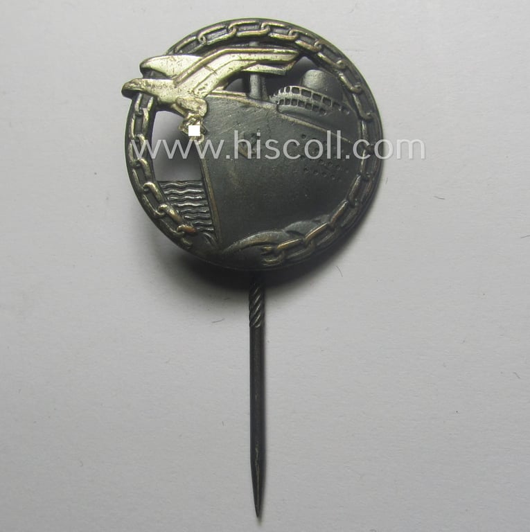 Attractive - and complete! - set comprising of a WH (KM) 'Blockadebrecher-Kriegsabzeichen' being a maker- (ie. 'Schwerin'-) marked example that comes together with its accompanying 'Halbminiatur' as stored in its (damaged- ie. relic) etui