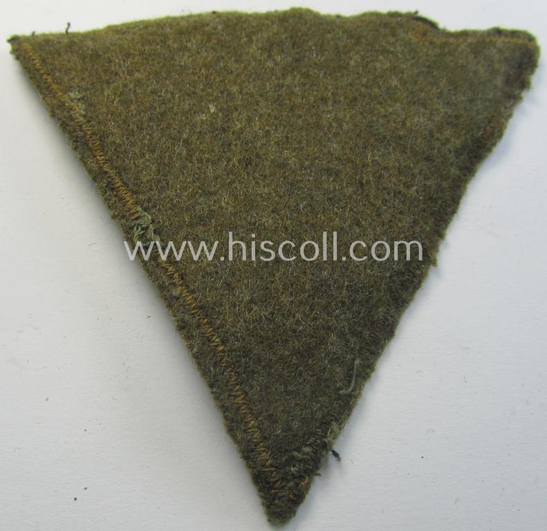 Attractive, so-called: N.S.K.K. (ie. 'National Socialistisches Kraftfahr Korps') arm-eagle (showing a combined arm-eagle and/or chevron) as executed in so-called: flatwire, 'BeVo'-weave pattern and comes mounted onto a beige-coloured background