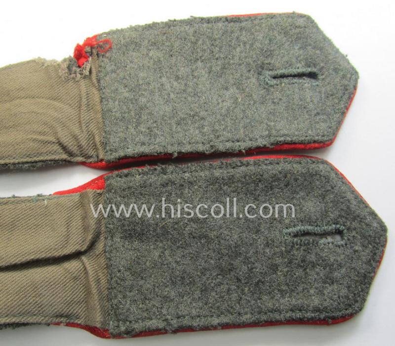 Truly used and worn pair of Eastern volunteers- (ie. 'Ostvölker'-) related shoulderstraps as intended for usage by a member within the: 'Russian Liberation Army' or: 'POA' (Cyrilic for 'ROA')