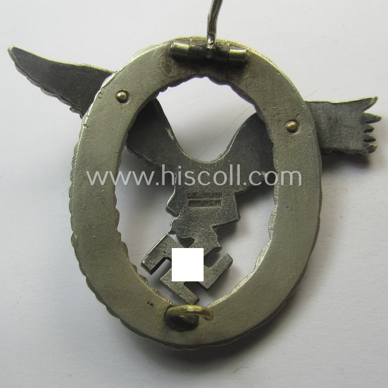 Early- (ie. pre-) war-period- and/or: 'Buntmetall'- (ie. 'Tombak'-) based: WH (Luftwaffe) 'Flugzeugführerabzeichen' (or: pilots-badge) being a maker- (ie. 'C.E. Juncker'-) marked example of the 'J3'-pattern