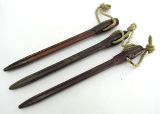 Matching set of 3 Bakelite tent pegs