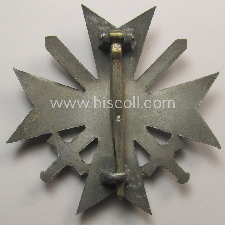 'KvK 1. Klasse mit Schwertern' being a neatly maker (ie. '4'-) marked example that comes in its non-maker- (but luxuriously-styled!) etui as issued