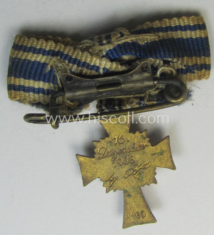 Miniature of an: 'Ehrenkreuz der deutschen Mutter - erste Stufe' (or: golden-class mothers'-cross) being a neatly maker- (ie. 'L/60'-) marked example that comes in an overall nice- (albeit moderately worn- ie. used-), condition