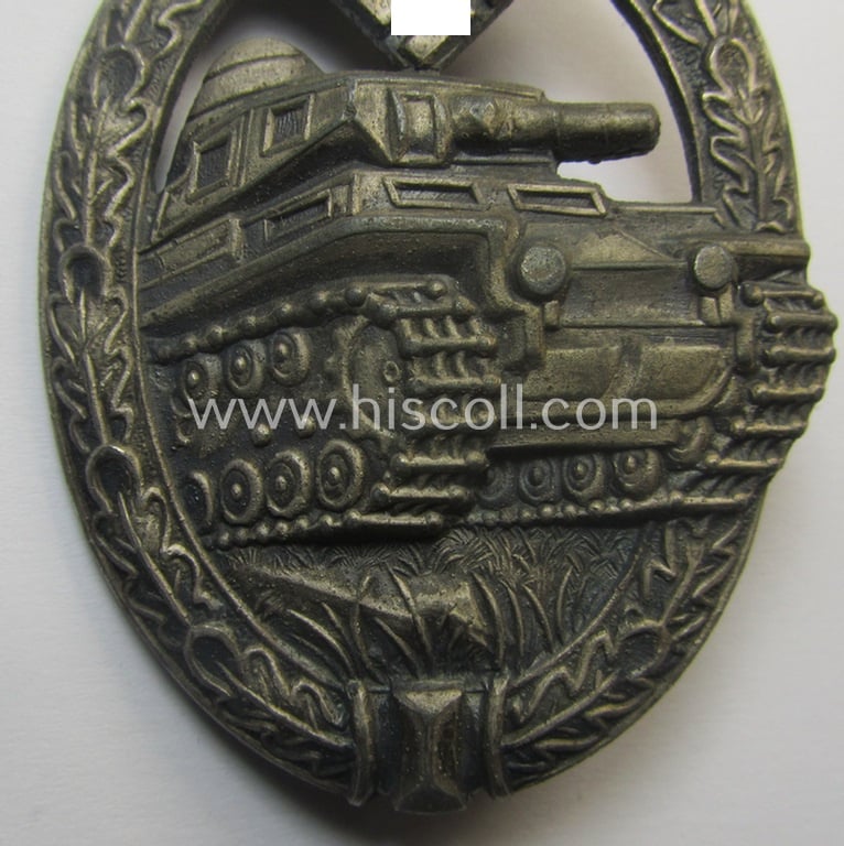 'Panzerkampfabzeichen in Silber' (or: silver-class panzer-assault badge or PAB) being a clearly maker- (ie. 'AS' in a triangle-) marked- and/or typical zinc- (ie. 'Feinzink'-) based specimen as was procuced by a to date unknown maker