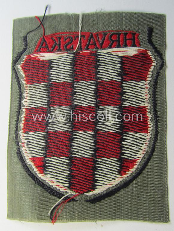 Superb, multi-coloured- and/or 'BeVo'-woven armshield (ie. 'Ärmelschild') entitled: 'Hrvatska' as was intended for usage by a volunteer who served within the 'Deutsche Wehrmacht' ie. within the 'Kroatische Legion'