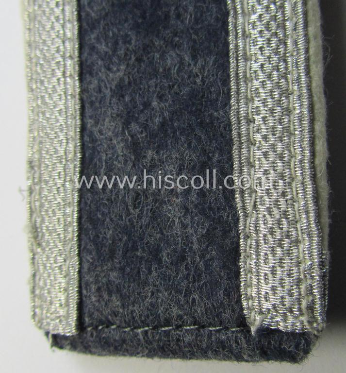 Neat - albeit regrettably single! - WH (Luftwaffe) NCO-type shoulderstrap as piped in the desirable white-coloured branchcolour as was intended for - and with certainty used by! - an: 'Unteroffizier der Hermann Göring-Division'