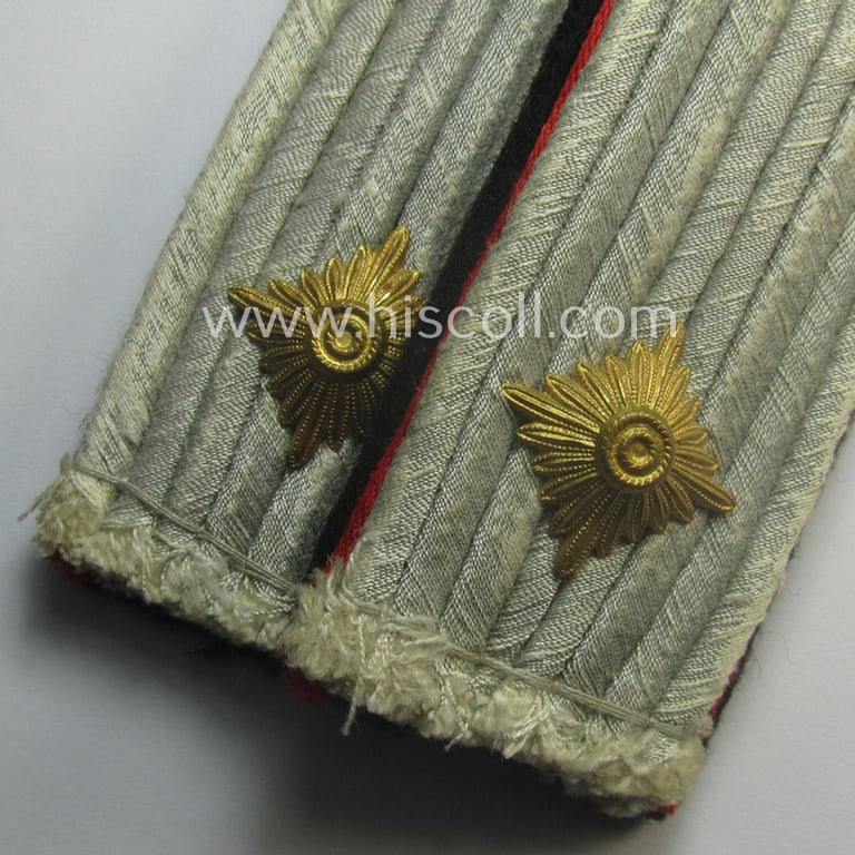 Superb - and fully matching! - pair of Waffen-SS officers'-pattern shoulderboards as piped in the bright-red-coloured branchcolour as was intended for usage by an: 'SS-Obersturmführer' who served within the: 'Waffen-SS (Sturm)Artillerie-Trpn.'