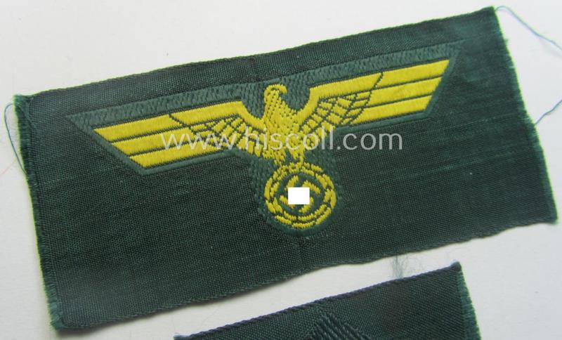 WH (KM ie. 'Küsten-Marine o. Marine-Art.') side-cap-eagle and cocarde-set (being a 'virtually mint- ie. unissued' set as executed in golden-yellow-coloured linnen on a darker-green-coloured background)
