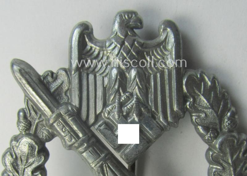 'Infanterie Sturmabzeichen in Silber' being a (typical) non-maker-marked and/or quite converse, 'solid-back' example as was executed in greyish-silver-coloured, zinc-based metal by the maker: 'Frank & Reif'