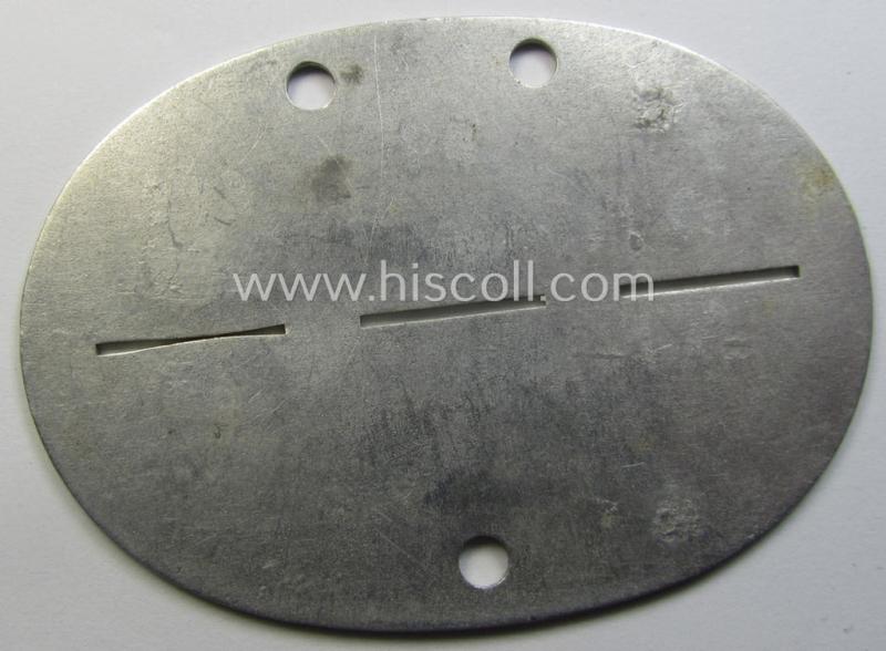 Aluminium-based, WH (Heeres-) ie. 'Feldgendarmerie'-related ID-disc (ie. 'Erkennungsmarke') bearing the clearly stamped unit-designation that simply reads: '3. Feldgend. 682' and that comes as issued and found