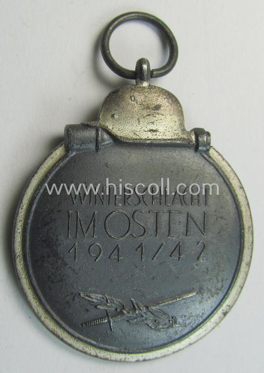 Attractive medal-set: 'Winterschlacht im Osten 1941-42' being a non-maker-marked- (and/or 'Feinzink'-based) specimen and that comes together with its (minimally confectioned) ribbon (ie. 'Bandabschnitt')