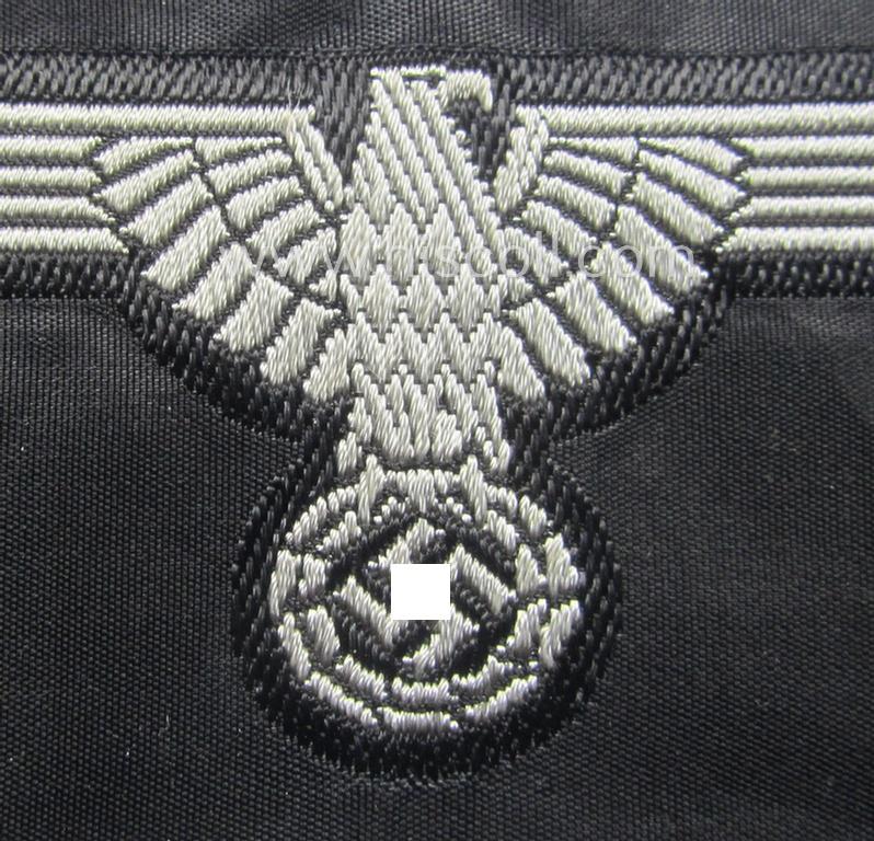 Mid- (ie. later-war-) pattern, 'SS' (ie. 'Waffen-SS') so-called: 'BeVo-weave-style', enlisted-mens'- ie. NCO-pattern arm-eagle (ie. 'Ärmeladler für Mannschaften u. Unterführer') as was intended for usage by the various Waffen-SS-troops