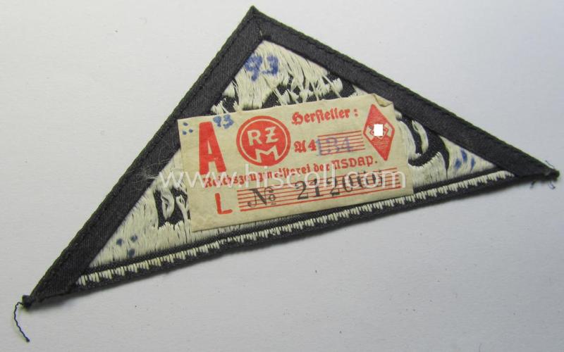 Neat, 'HJ' ('Hitlerjugend') ie. 'BDM' ('Bund Deutscher Mädel') district-triangle (ie. 'Gebietsdreieck') entitled: 'Südost Oberdonau' (being a 'virtually mint' example that retains its period-attached, paper-based so-called: 'RzM'-etik...