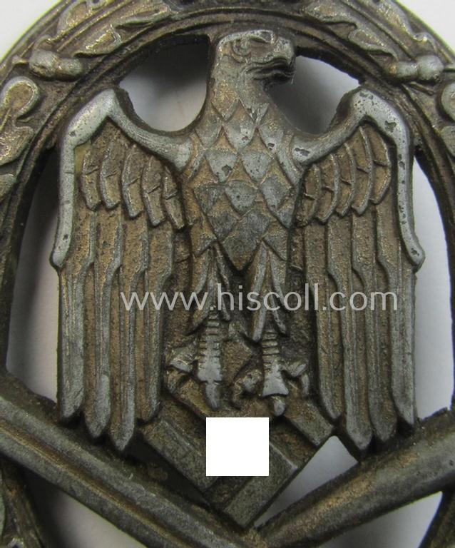 'Allgemeines Sturmabzeichen' (or: General Assault Badge ie. GAB) being a typical unmarked, zinc-based- (ie. 'Feinzink'-) and/or: 'semi-hollow-back'-version as was (I deem) produced by the: 'Rudolf Karneth'-company