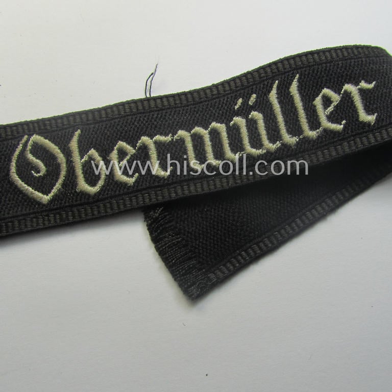 SA- (ie. 'Sturmabteilungen') honorary-cuff-title (ie. 'Ärmelstreifen') entitled: 'Fritz Obermüller' (as was intended for SA-members serving within the: 'SA-Standarte 6 / SA-Gruppe Alpenland')