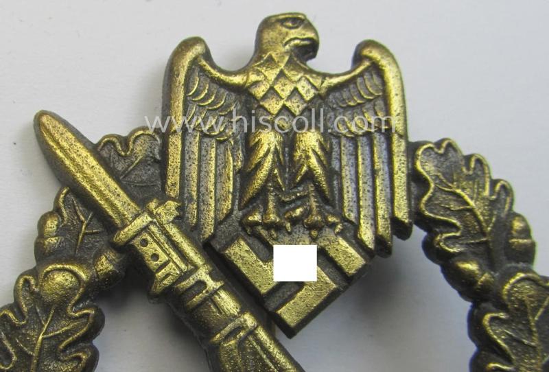 'Infanterie Sturmabzeichen in Bronze' being a maker- (ie. 'JFS'-) marked, 'solid-back' example by the desirable maker: 'Josef Feix u. Söhne' as was executed in golden-bronze-coloured, zinc-based metal