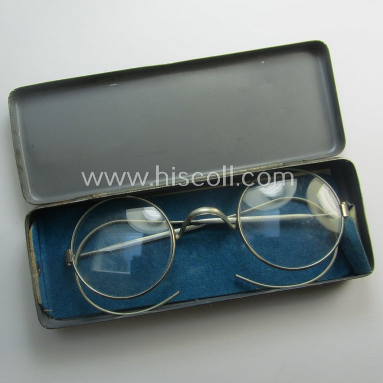 Complete pair of 'standard-issued'-pattern, WH-service-glasses (ie. 'Dienstbrille') as issued to the: 'Gefr. Peter Thönes' (or alike) serving within the 'Truppenteil': 'L47425' and that comes stored in its period-container