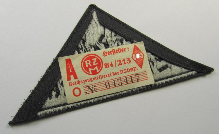 Neat, 'HJ' ('Hitlerjugend') ie. 'BDM' ('Bund Deutscher Mädel') district-triangle (ie. 'Gebietsdreieck') entitled: 'Südost Steiermark' still retaining its period-attached-, paper-based so-called: 'RzM'-etiket