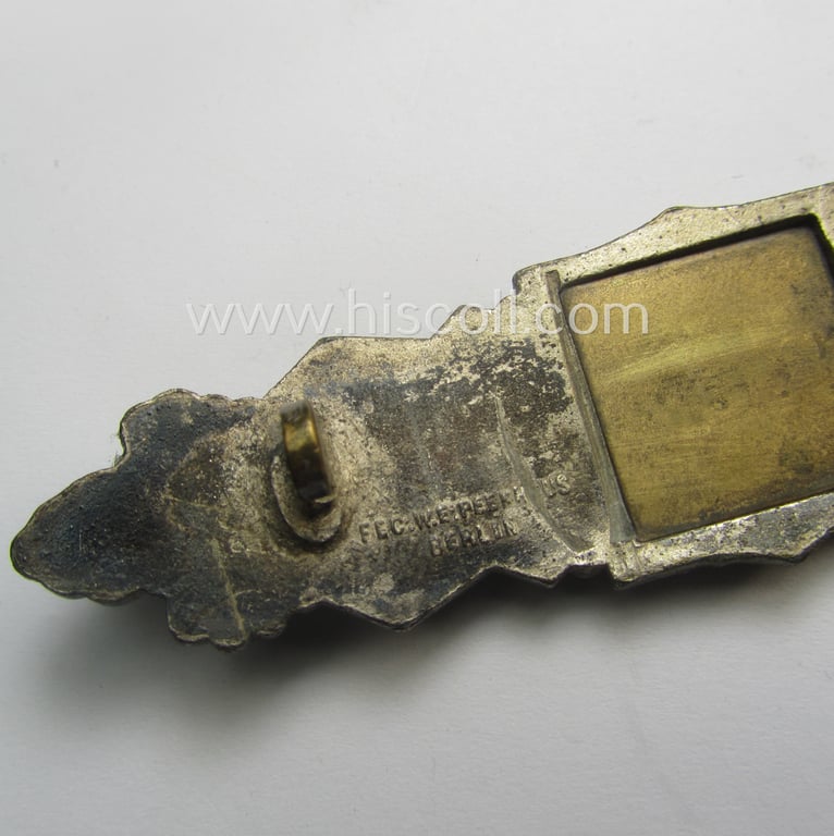 Superb, 'Nahkampfspange in Silber' (or: silver-class close-combat clasp ie. CCC) being a (typical) maker-marked- and/or minimally converse-shaped specimen as was produced by the maker- (ie. 'Hersteller') 'Friedrich Linden' (ie. FLL)