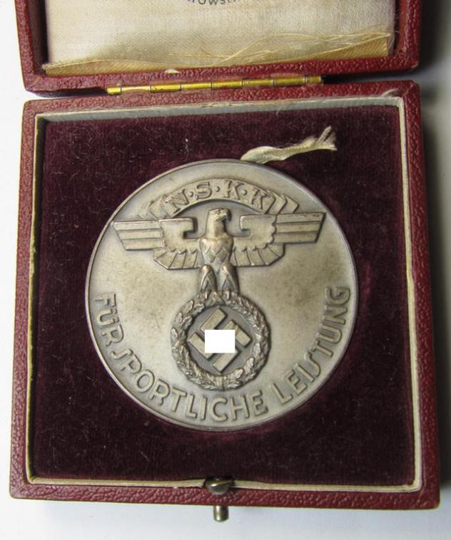 Superb, commemorative plaque (ie. 'Erinnerungs- o. nichttragbare Auszeichnungsplakette') showing an N.S.K.K.-eagle-device and text: 'Für Sportliche Leistungen' and that comes stored in its period etui