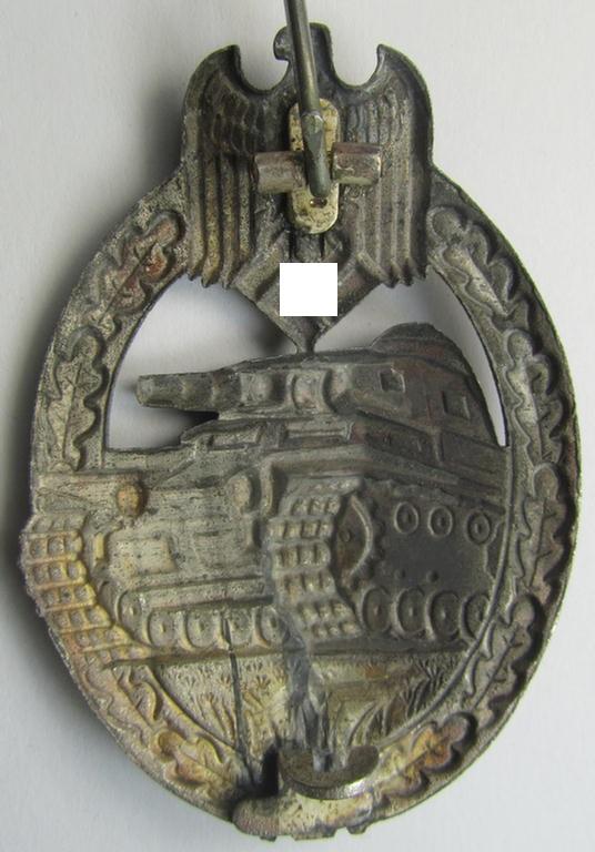 'Panzerkampfabzeichen in Silber' (or: silver-class panzer-assault badge or PAB) being a hollow-type, non-maker-marked- and/or zinc- (ie. 'Feinzink'-) based specimen as was procuced by the: 'Gebr. Wegerhoff'-company