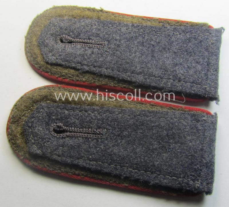 Pair of WH (Luftwaffe) NCO-type shoulderstraps as piped in the bright-red branchcolour as was intended for an: 'Uffz. o. Unterwachtmeister der Flak-Art.-Trpn.'