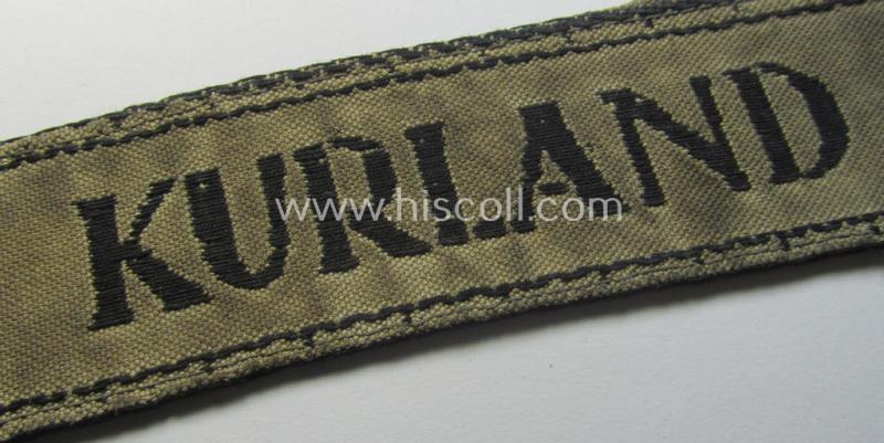 WH (Heeres ie. Kriegsmarine) cuff-title- ie. armband (ie. 'Ärmelstreifen') entitled: 'Kurland' that comes in an overall very nice- (albeit clearly used- ie. tunic-removed-), condition