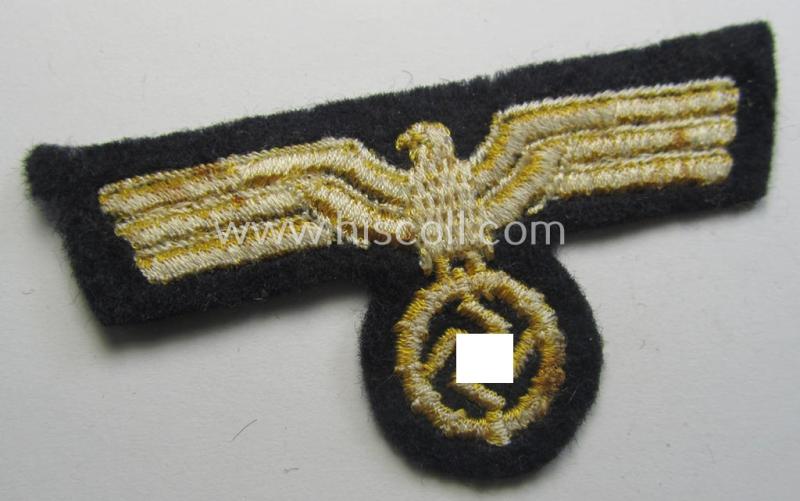 Attractive, WH (KM) EM ie. NCO-type, machine-embroidered visor-cap-eagle as executed in yellow-coloured linnen as intended for usage on the various naval, EM- ie. NCO-pattern visor-caps