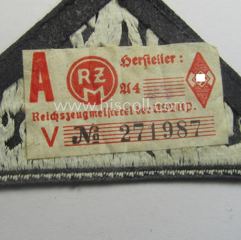 'HJ' ('Hitlerjugend') ie. 'BDM' ('Bund Deutscher Mädel'-) district-triangle (ie. 'Gebietsdreieck') entitled: 'West Düsseldorf' (being a minimally used- and/or worn example that retains its 'RzM'-etiket)
