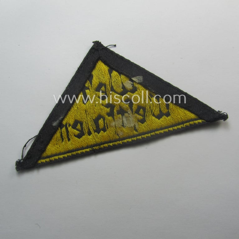 Truly used and/or worn 'HJ' ('Hitlerjugend') district-triangle (ie. 'Gebietsdreieck') entitled: 'West Westfalen'