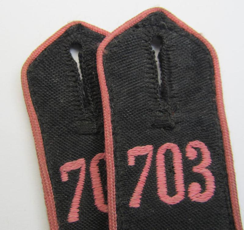 Moderately worn - and fully matching! - pair of bright-pink-piped so-called: 'Motor-HJ'-shoulderstraps as was intended for a: 'Hitlerjunge' who served within the 'Bann 703' (703 = 'Bann Zweibrücken' in the 'Gebiet West Saarpfalz/Westmark'